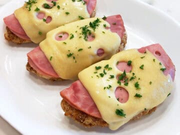 The chicken is served on a white platter.