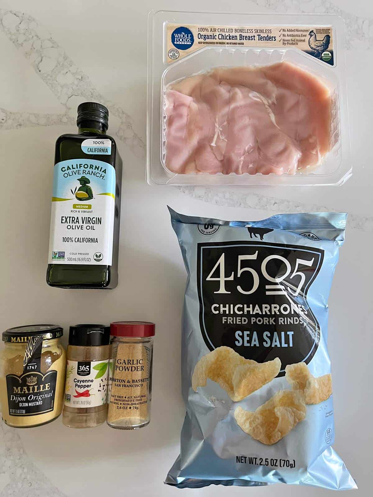 The ingredients needed to make pork rind chicken tenders.