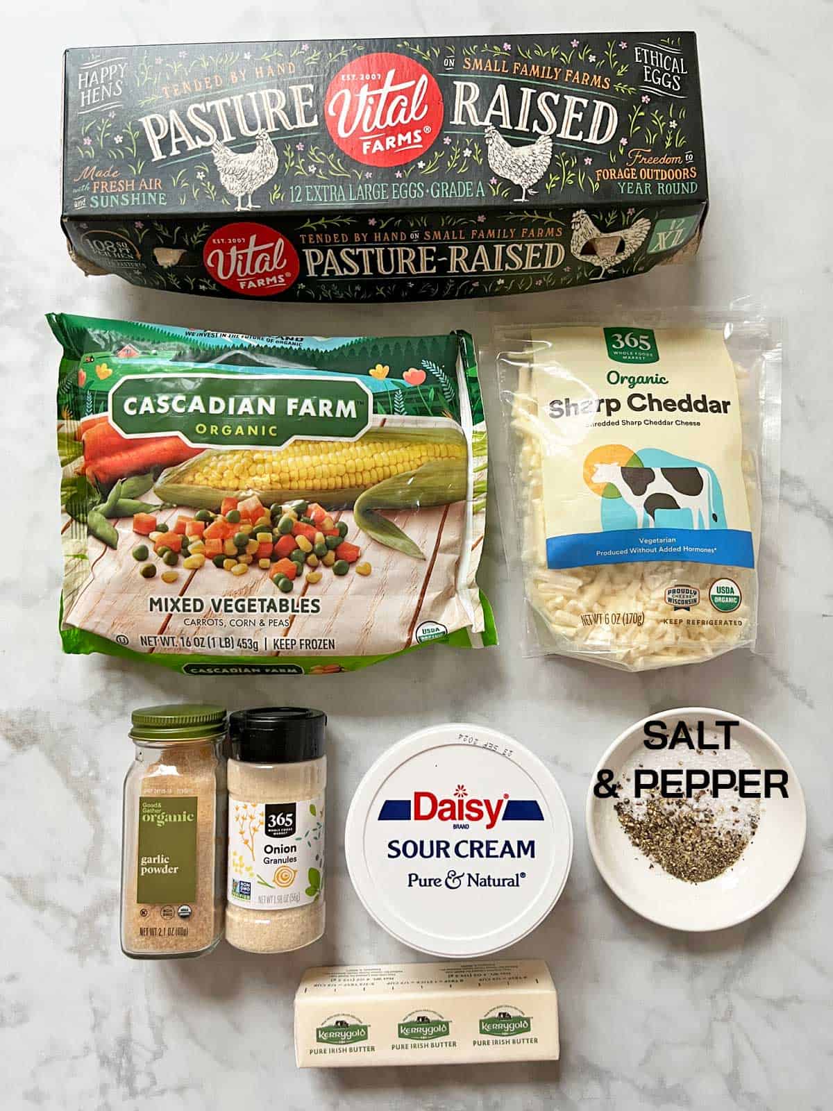 The ingredients needed to make a crustless vegetable quiche.