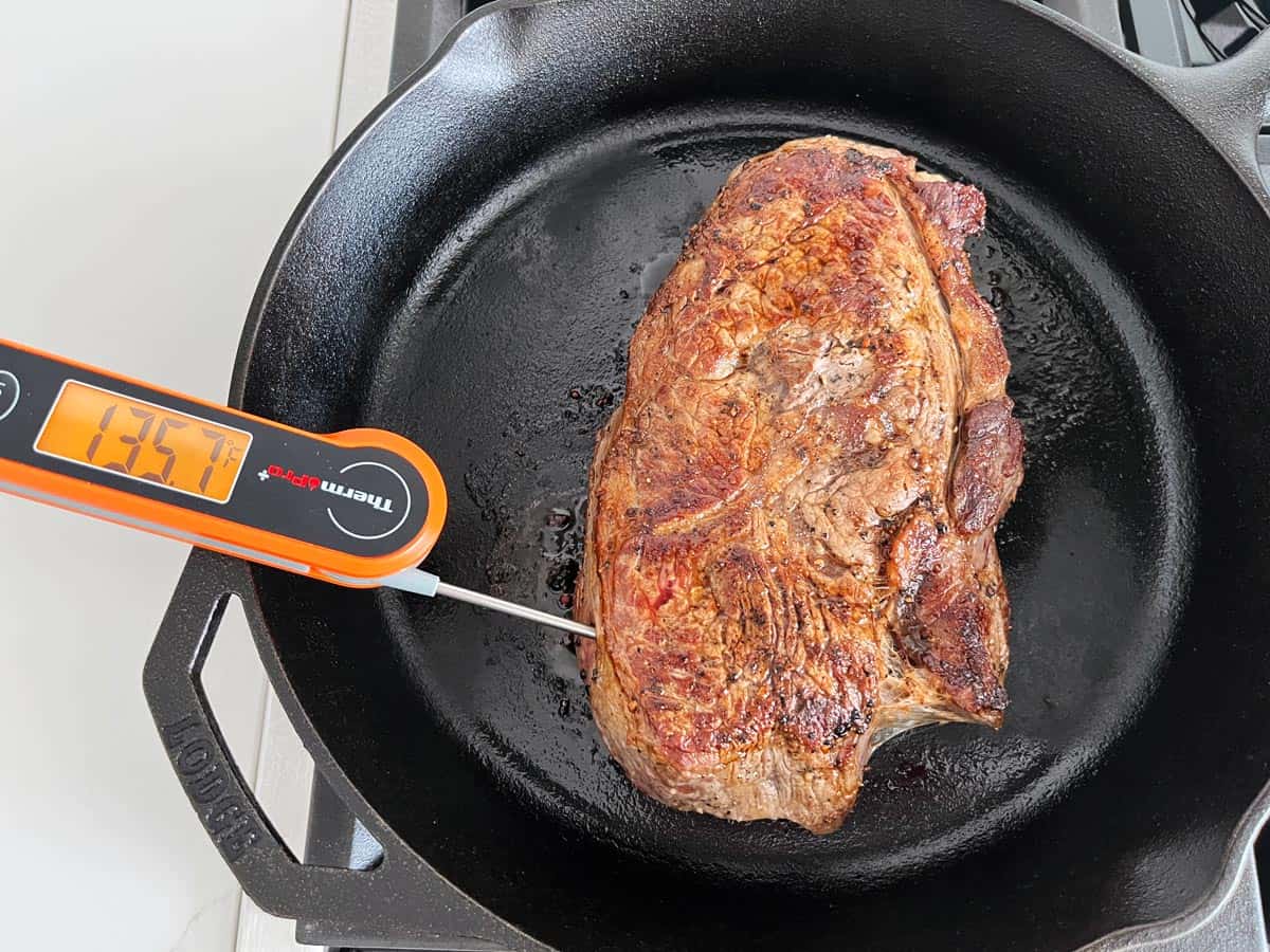 The steak has reached 135 degrees.