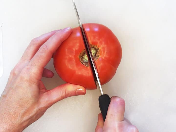 Cutting a tomato.