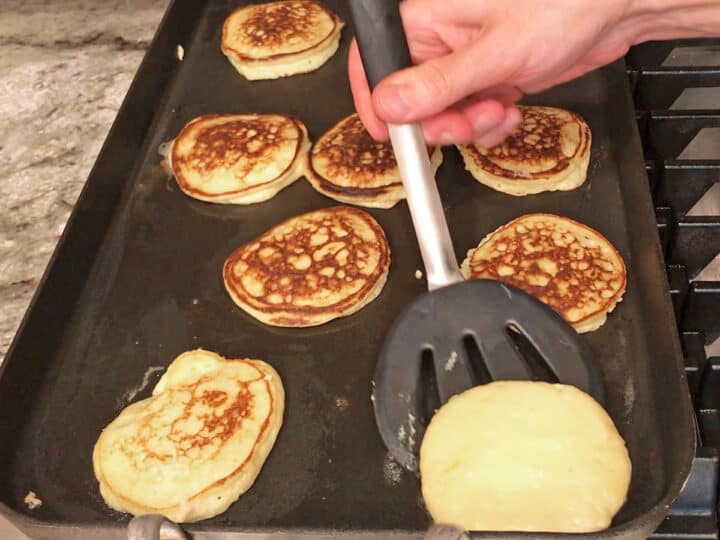 Flipping the pancakes.