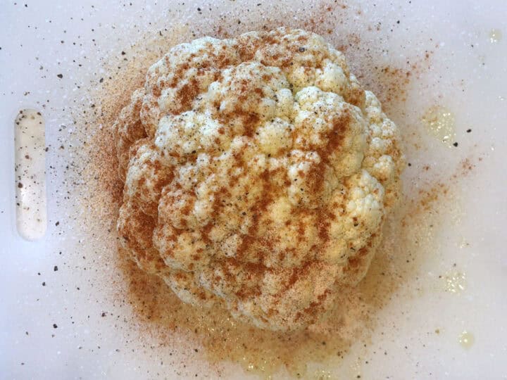 The cauliflower head was coated in olive oil and spices.