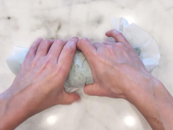 Rolling the sandwich.