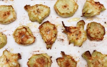 The broccoli stem slices are ready on the pan.