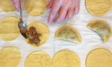 Filling the empanadas.