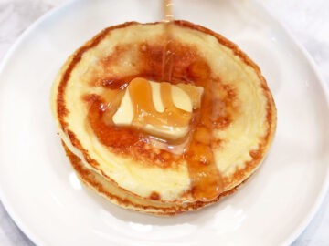 Serving the pancakes.