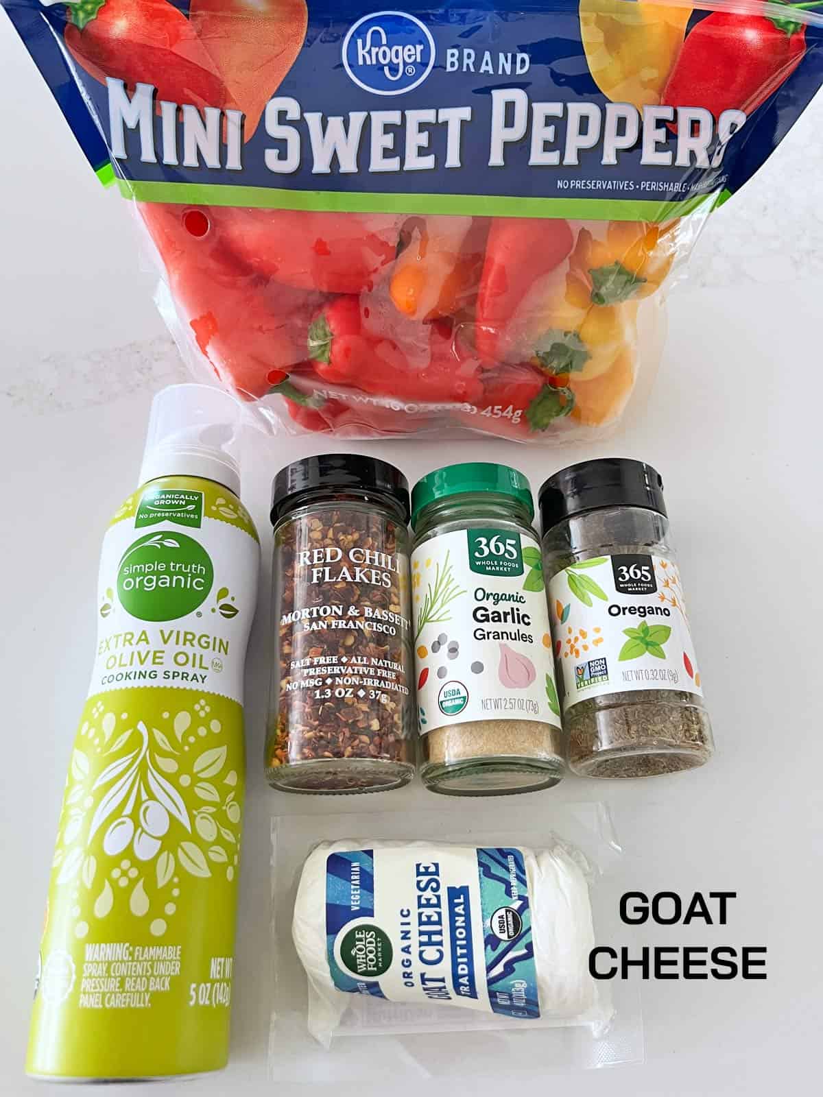 The ingredients needed to make stuffed mini peppers.