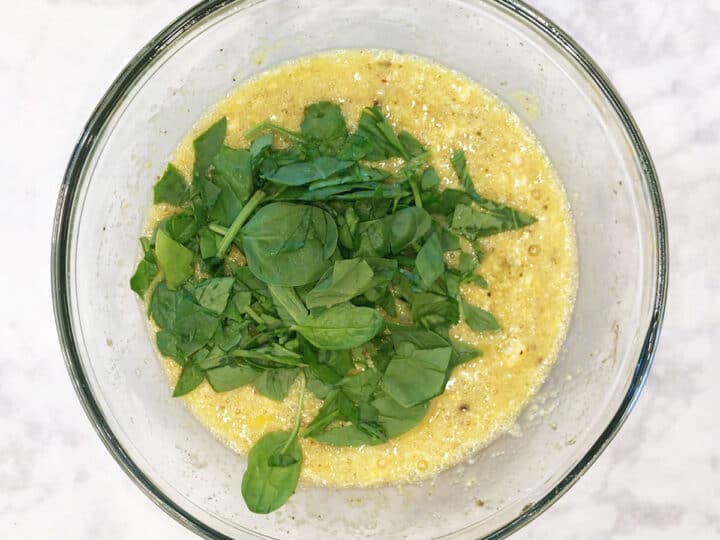 Spinach was added to the mixing bowl.