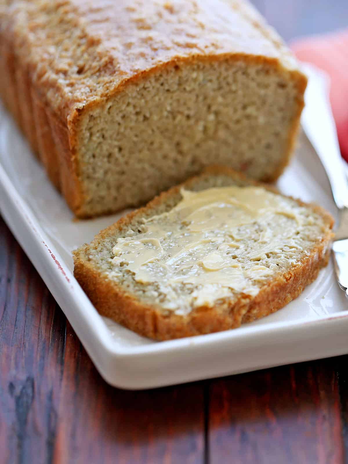 Almond flour bread was sliced and topped with butter.