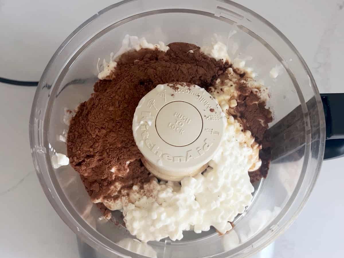The mousse ingredients are in the food processor.