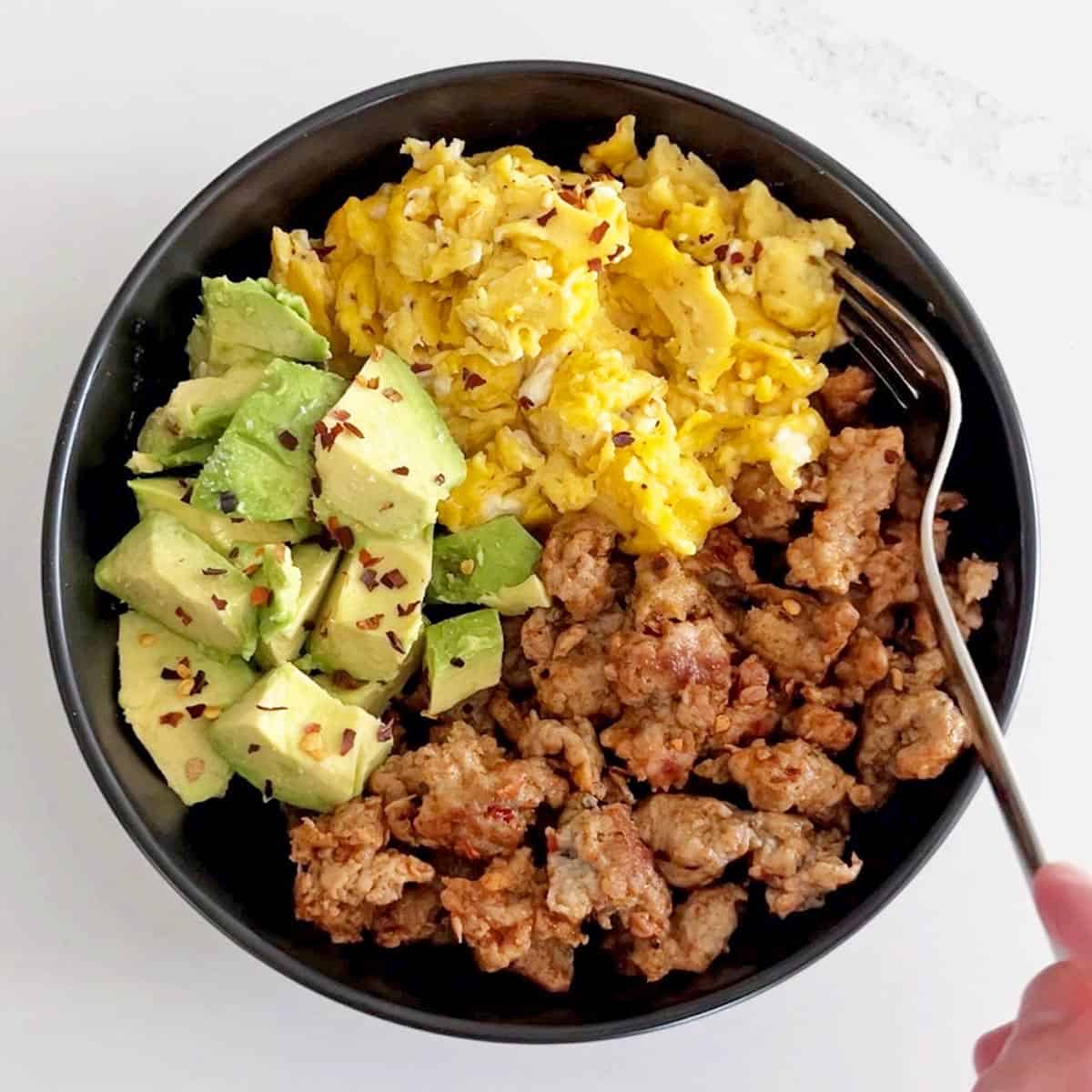 The bowl is served with a fork.