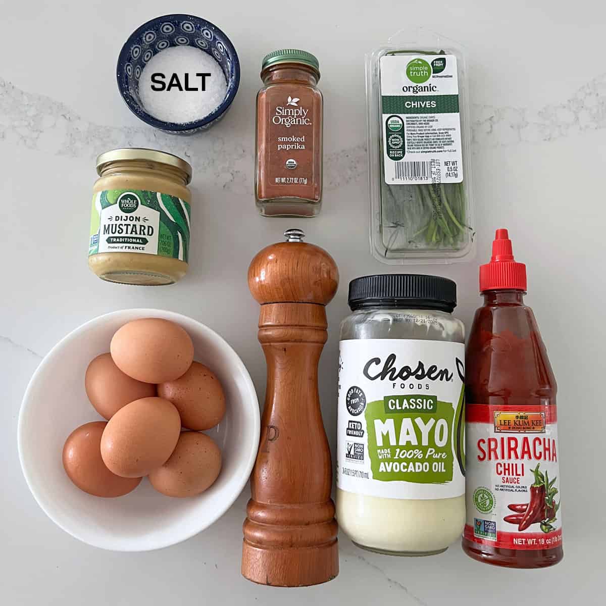 The ingredients needed to make deviled eggs.
