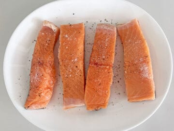 The salmon was seasoned with salt and pepper.