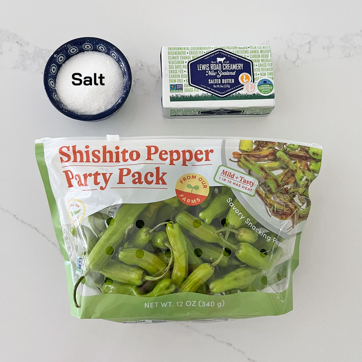 The ingredients needed to cook shishito peppers.