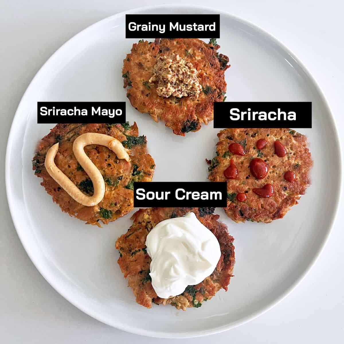 Four tuna patties with four different toppings, including sriracha mayo.