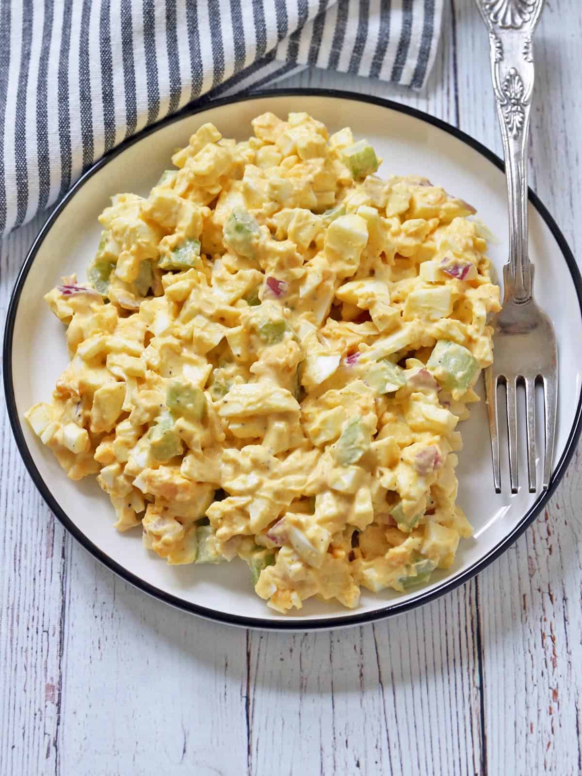 Egg salad is served on a plate.
