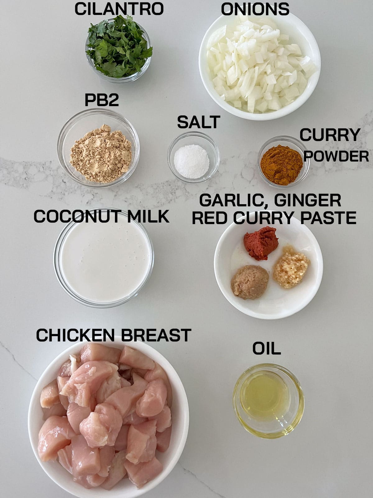 The ingredients needed to make Thai chicken curry.