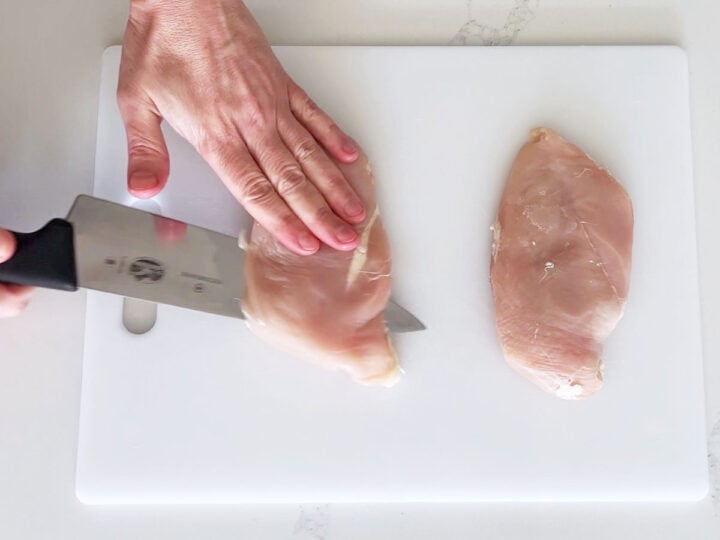Slicing the chicken breasts.