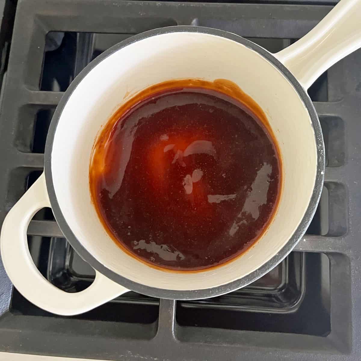 The teriyaki sauce is ready and thickened in the saucepan.