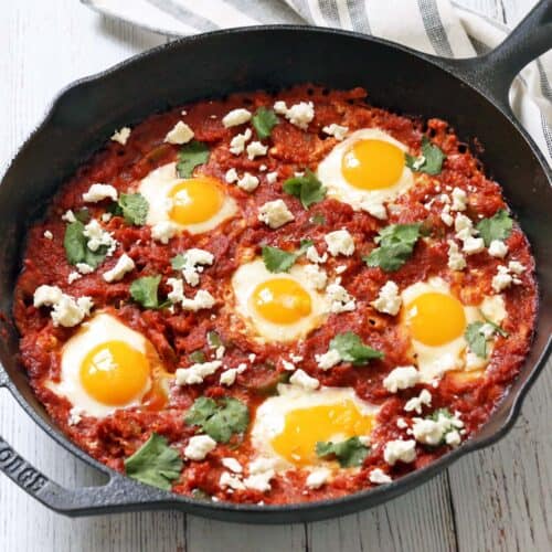 Shakshuka is served in a cast-iron skillet.