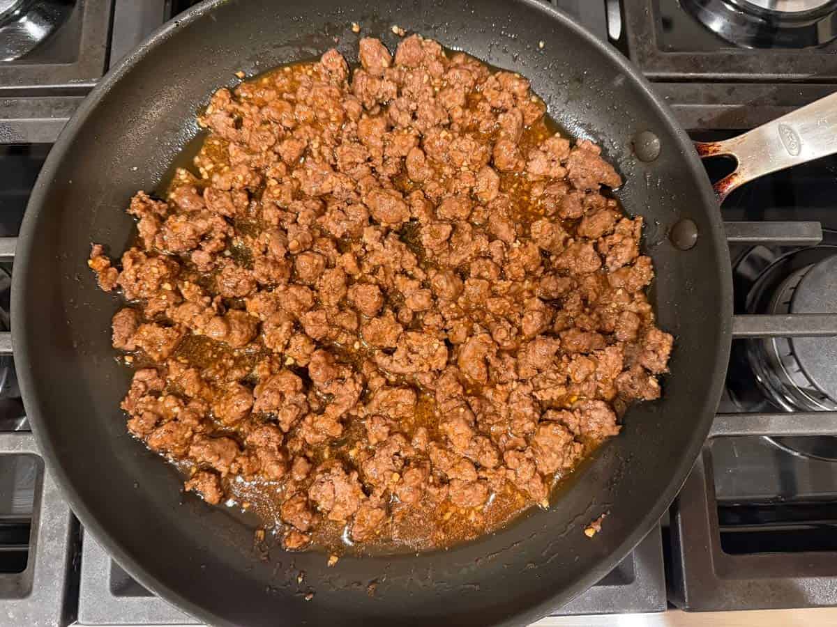 Saucy Korean ground beef in a skillet.