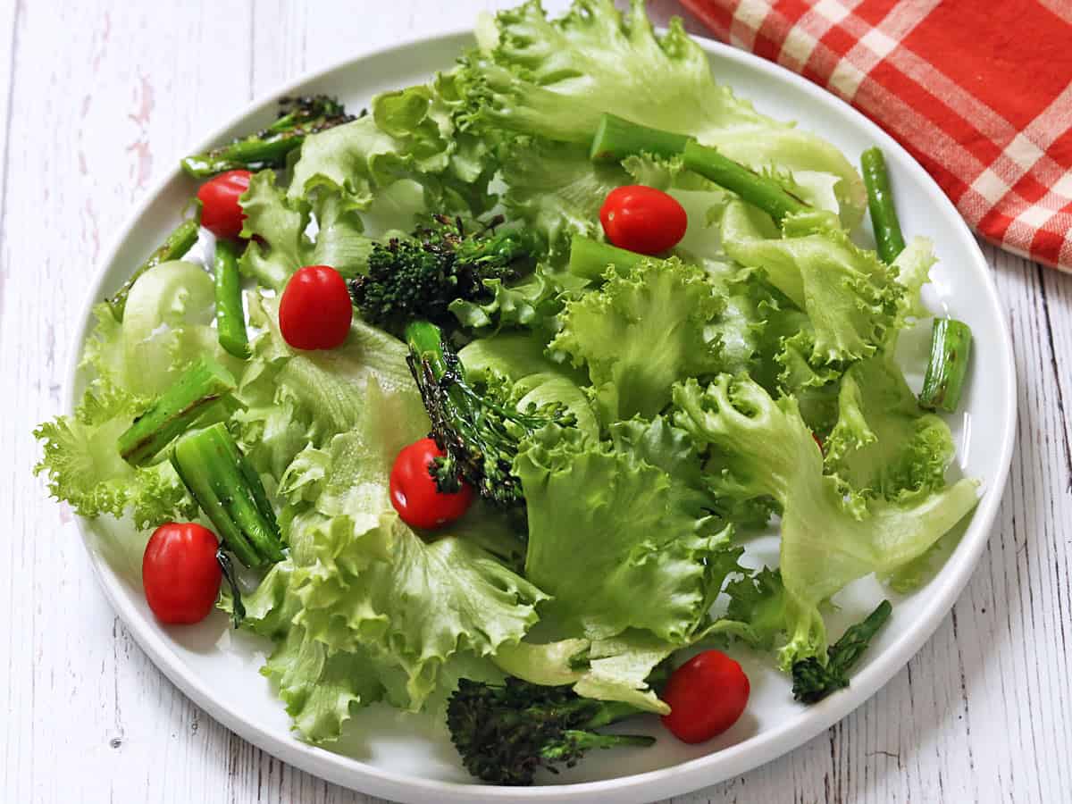 Broccolini leftovers are served in a salad.